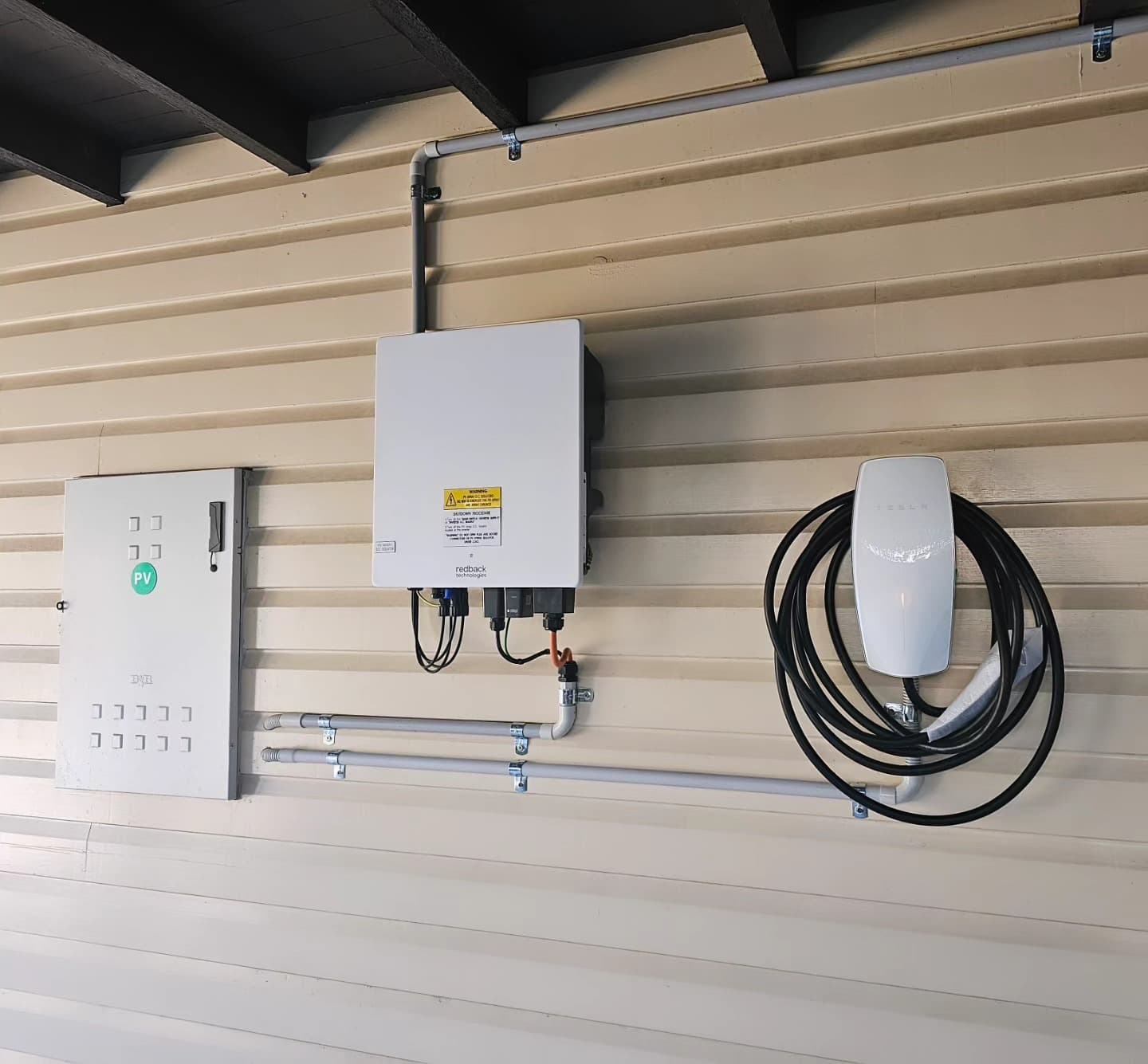 Tesla Wall Connector installed with Redback solar inverter