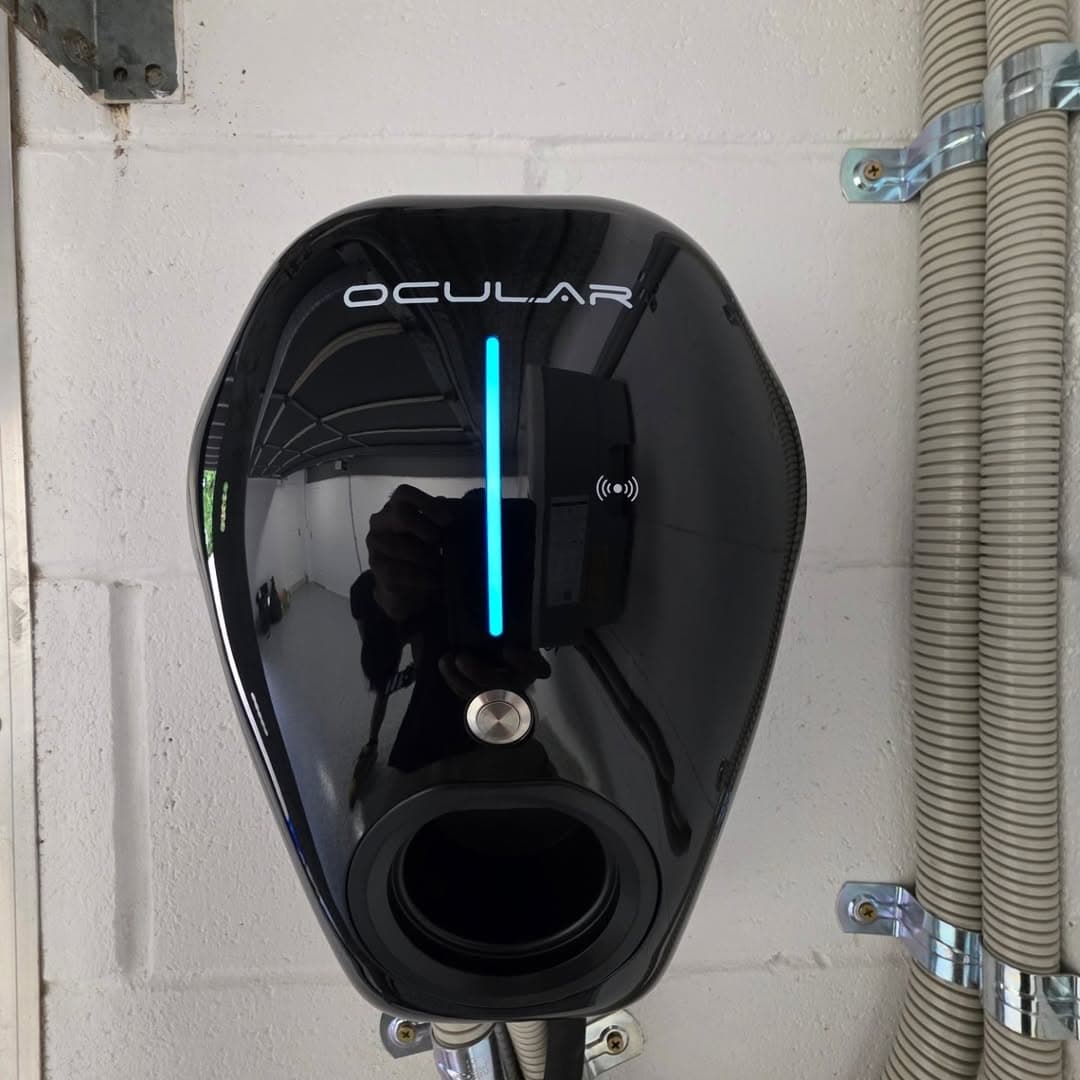 Ocular EV charger close-up with blue LED